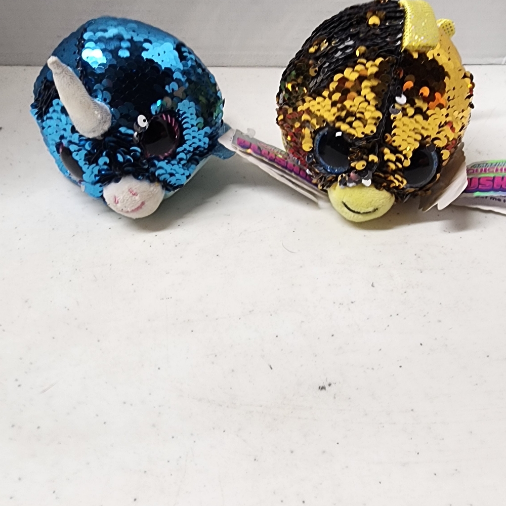 Reversible Sequin Unicorn and Bumblebee Stuffed Animals